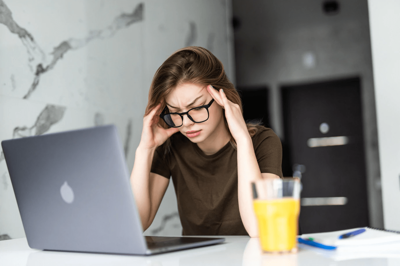 worried woman using a laptop
